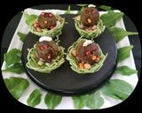 A picture of step 7 of Green Falafel In Spaghetti Nests.
