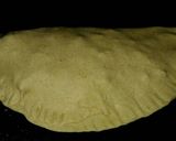 A picture of step 5 of Pizza paratha.