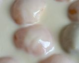 Une image de l'étape 2 de Flan aux pêches.