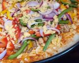 A picture of step 8 of My 1st trial chicken pizza.