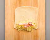 Foto del paso 2 de la receta: Rollitos de pizza