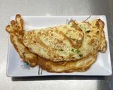 A picture of step 5 of Thai omelette (Kai Jeow).