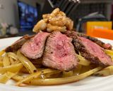A picture of step 7 of Surf n’ Turf over Garlic Basil Fettuccine.