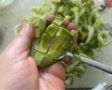 A picture of step 2 of Celery with Avocado and Green Onion.