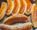A picture of step 2 of Bratwurst 🌭 with Peppers and Onions 🧅.