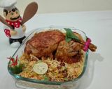 A picture of step 9 of Lahori Chargha with Masala Rice.