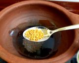 A picture of step 2 of Kerala sardine fish curry.