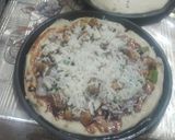 A picture of step 11 of Tikka piza.