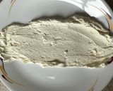 A picture of step 4 of Ginger biscuit log cake.