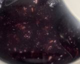 A picture of step 1 of Kavuni Arisi Kanji / Black Rice Porridge.