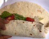A picture of step 5 of Tortilla chicken wrap.
