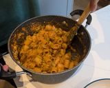 A picture of step 6 of Pasta alla vodka, with pork and sprouts.