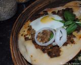 A picture of step 16 of Pizza with minced beef and egg.