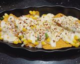 A picture of step 4 of Vegetable cheesy nachos.