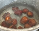 A picture of step 1 of Bacon wrapped chestnuts.