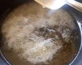 A picture of step 4 of Moong Dal Halwa Cigars dipped in Shaahi Rabdi.
