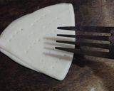 A picture of step 8 of Badam puri.