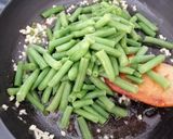 A picture of step 2 of French Beans sautéed in butter and garlic.