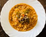 Foto del passaggio 6 della ricetta Risotto peperoni e semi di girasole