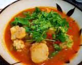 A picture of step 4 of Sea scallops in tomato onion soup.