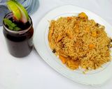 A picture of step 4 of Jollof rice with smoked fish.