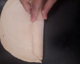 A picture of step 4 of Satpura (Deep fried dessert).