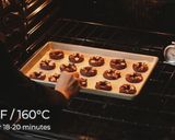 A picture of step 7 of Christmas Wreath Cookies [Chocolate Spritz].
