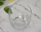 A picture of step 1 of Kiwi mojito.