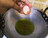 A picture of step 2 of Stir Fried Aloo Mirchi.