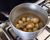 Foto del paso 2 de la receta: Papas con ajo y perejil
