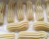 Foto del paso 3 de la receta: Churros rellenos Dulce de leche