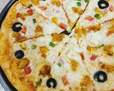 A picture of step 5 of Chicken Tikka Pizza 🍕🍕.