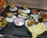 राजस्थानी स्टफ दाल -बाटी(बिना ओवन और बाटी कूकर के)साथ लहसुन चटनी रेसिपी चरण 14 फोटो
