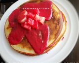 A picture of step 10 of Coconut creme stuffed pancakes.