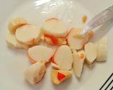 Foto del paso 5 de la receta Tapa con tacos de emmental y surimi de cangrejo