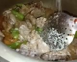 A picture of step 3 of Chicken yakhni pulao.