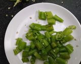 A picture of step 1 of Green chilli lunji.