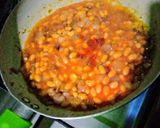 A picture of step 2 of Baked beans curry.