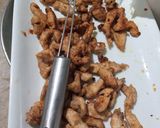 A picture of step 3 of Kungpao chicken with fried rice.