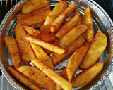 Foto del paso 5 de la receta: Patatas condimentadas al horno