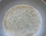 A picture of step 1 of Porridge with blueberries and strawberry jam.