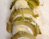 A picture of step 3 of Eggcado slices.
