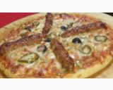 A picture of step 1 of Chatpata beef seekh kabab Pizza.