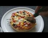 चीजी पैन पिज़्ज़ा (Cheesy pan pizza recipe in Hindi) रेसिपी चरण 7 फोटो