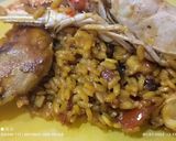 Foto del paso 6 de la receta: Arroz con manitas de conejo, cigalas, sepia y langostinos