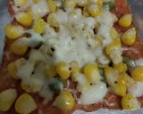 A picture of step 5 of Corn Cheese Bread Pizza.