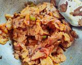 A picture of step 5 of रोटी के पोहे (कढ़ाई में).
