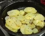 A picture of step 3 of Masala potatoes slices.