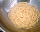 A picture of step 3 of Spaghetti with tomato sauce and cheddar cheese 😍.