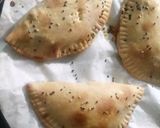 A picture of step 4 of Tasty calzone pockets.